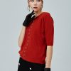 Bright diamond twist knit top
